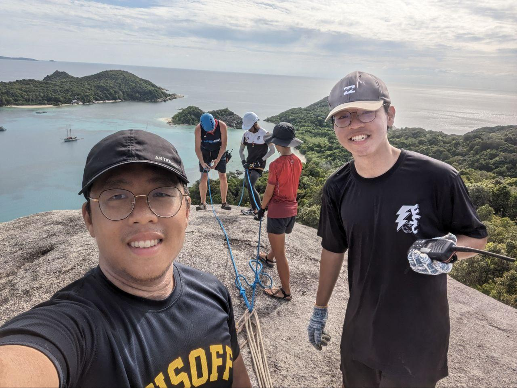 The student team in front of Rakata Island
