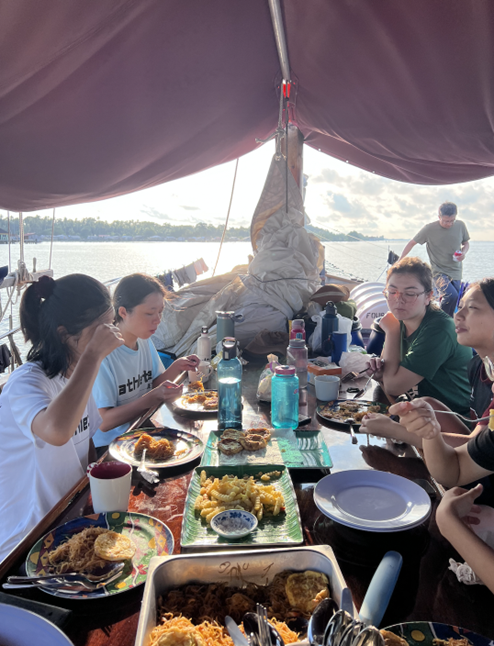 A typical scene during mealtime at the deck dining table